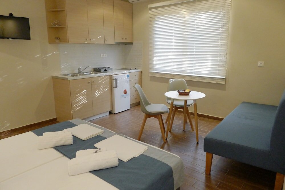 Фото Ampoulos Rooms & Apartments