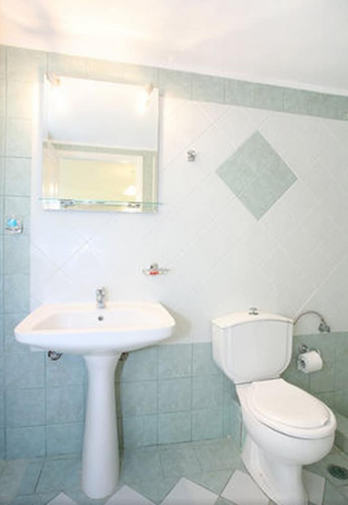 Фото Armonia Apartments & Studios