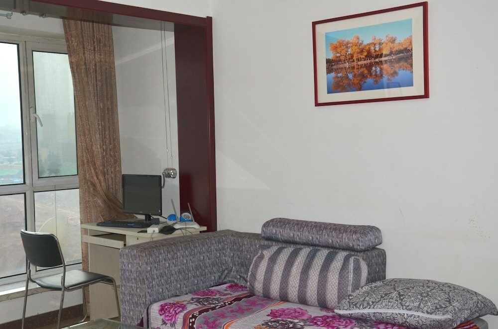 Фото Lanzhou Longshang Mingzhu Apartment Two-bedroom suite