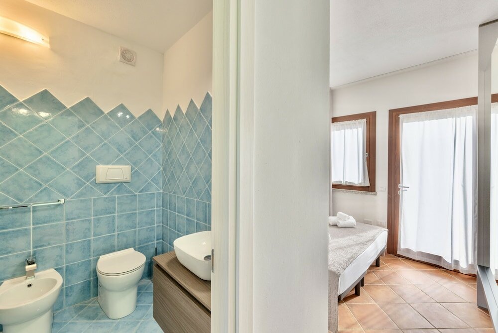 Фото Residence with pool in Isola Rossa