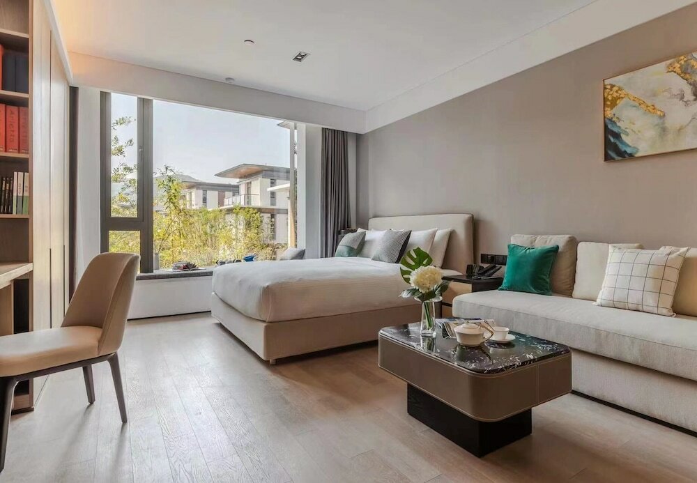 Фото Suzhou Yi Tang Service Apartment