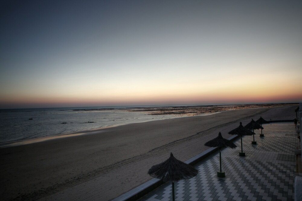 Фото Playa De La Luz Hotel
