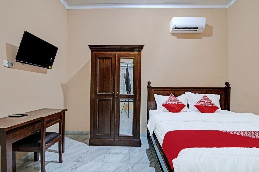 Фото Oyo 92223 Alfatar Homestay Syariah