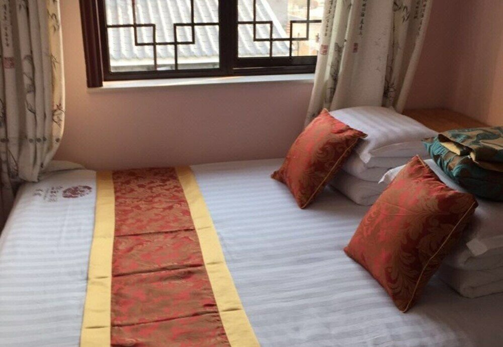 Фото Xinyue Folk Farmhouse Inn