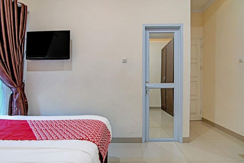 Фото Oyo 91269 R&s Living Residence