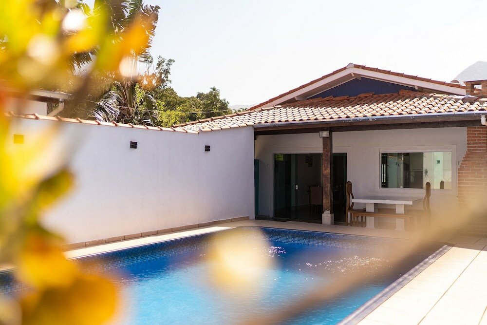 Фото Aconchegante casa em condomínio fechado com lazer completo