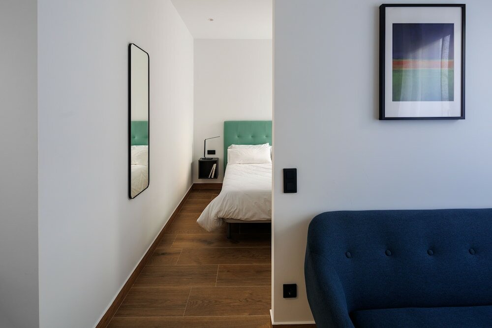 Фото Apartamentos Congreso Parking Gratuito