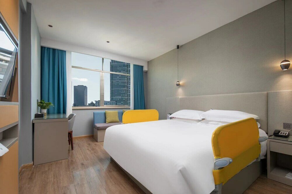 Фото Yiwu Manting City Hotel