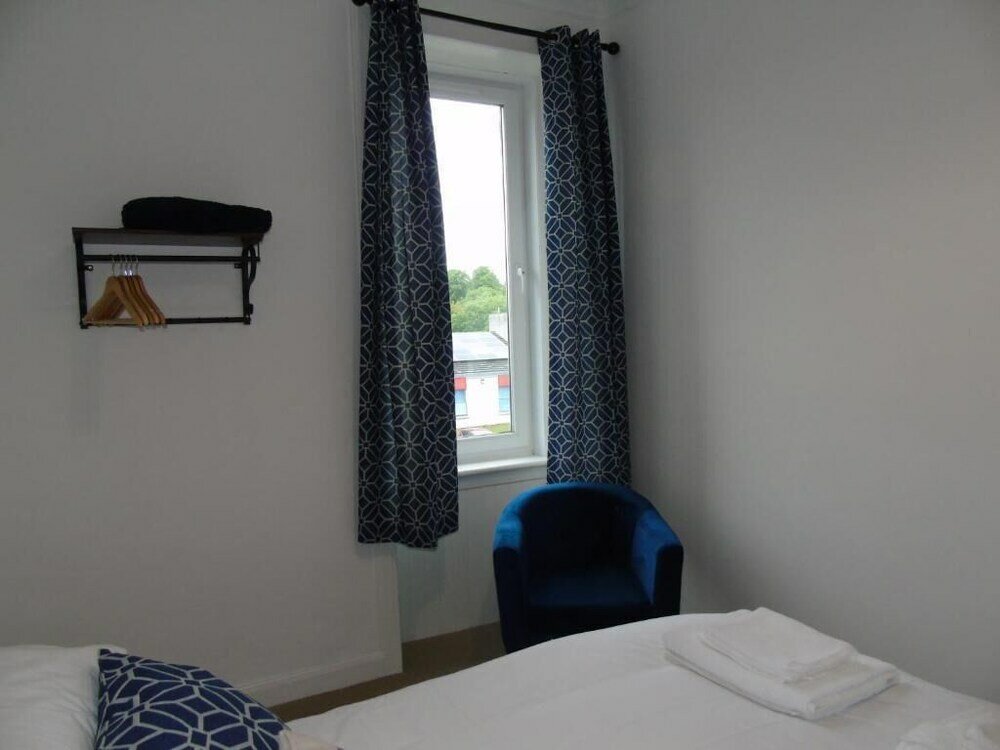 Фото Snug - Sealladh Mara Apartment