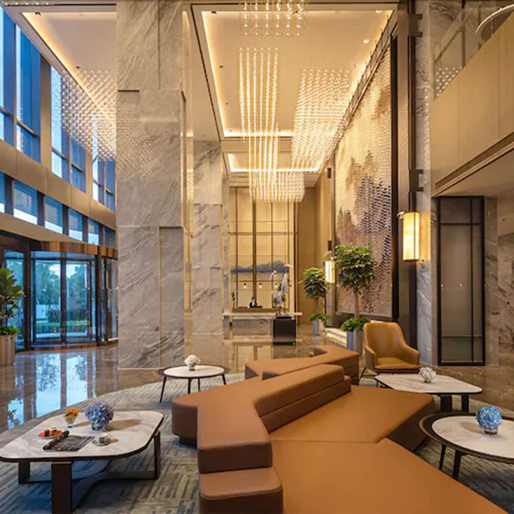 Фото New Century Hotel Zhenhai