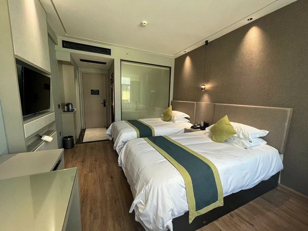 Фото Yiwu Manting City Hotel