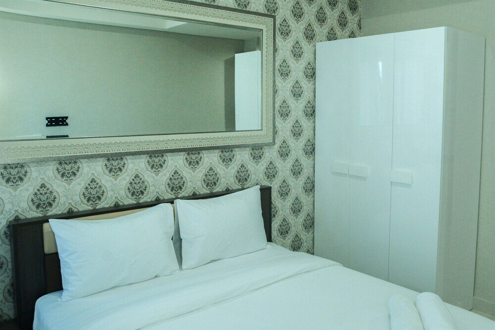 Фото Modern City View Studio Apartment at Puri Mansion