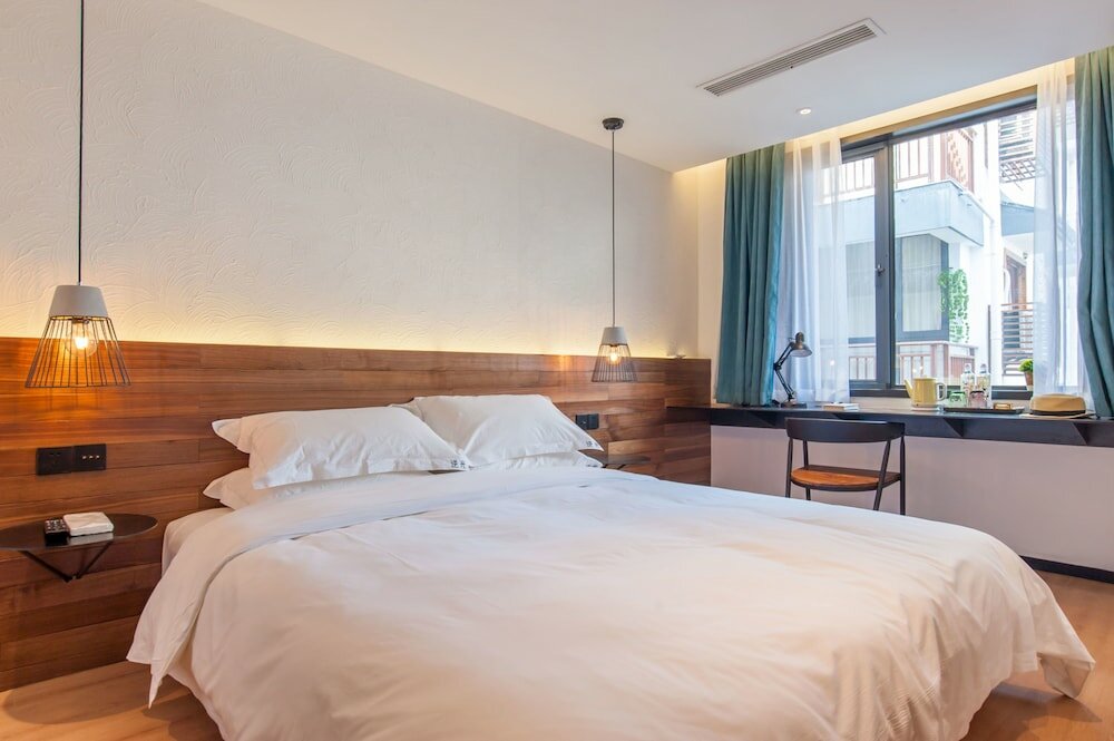 Фото Hangzhou Backlighting Inn