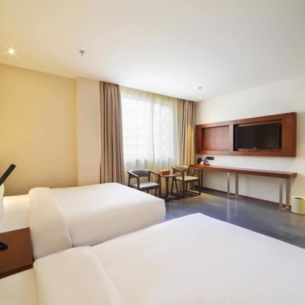 Фото Xinyuan Hotel Better