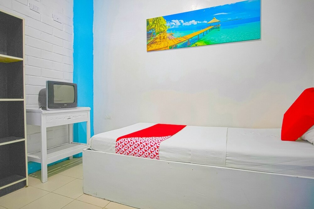 Фото Oyo 749 La Maria Pension And Tourist Inn Hotel