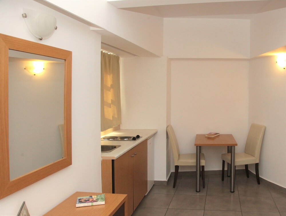 Фото Mimosa Suites