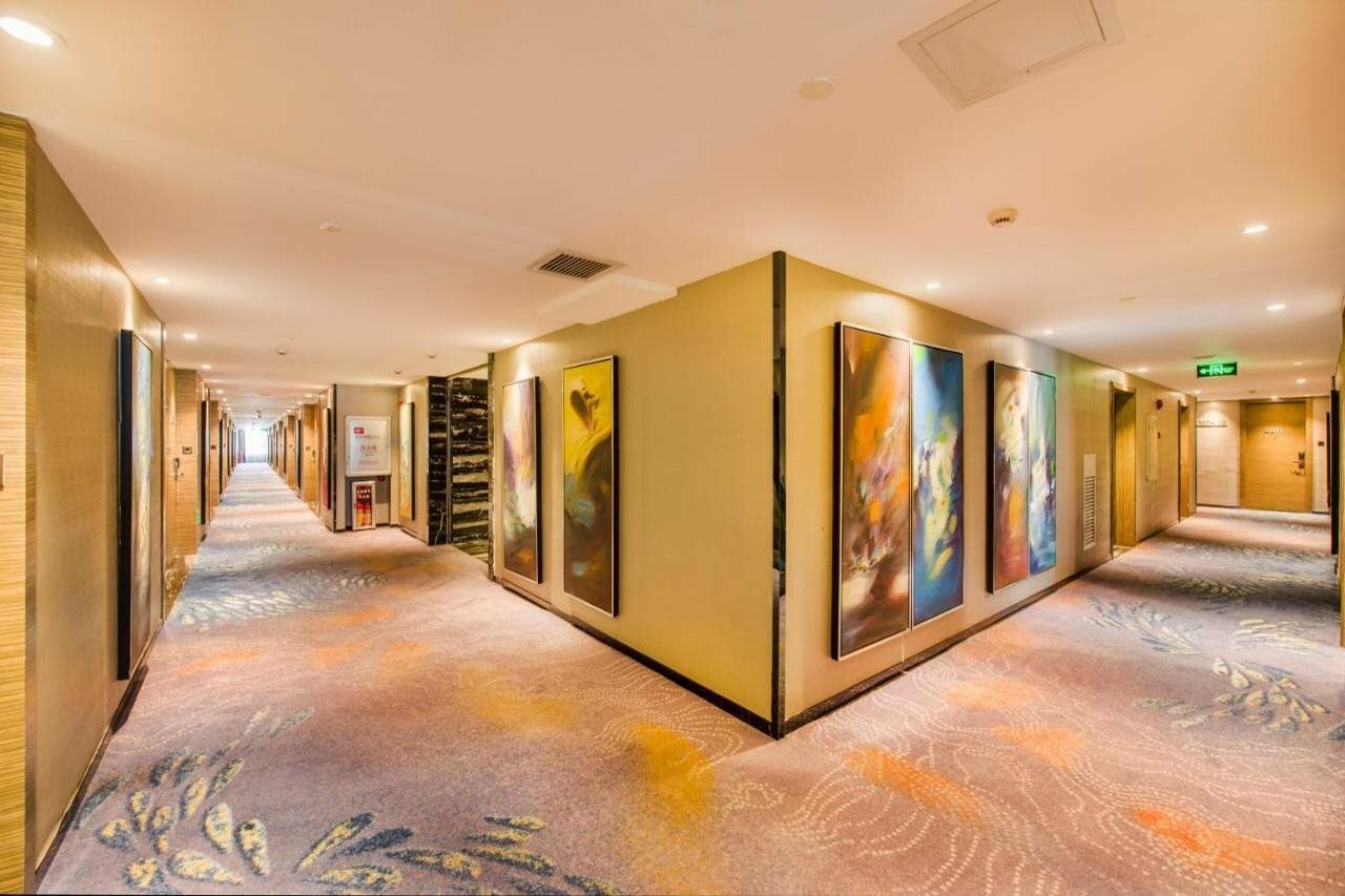 Фото La Perle International Hotel