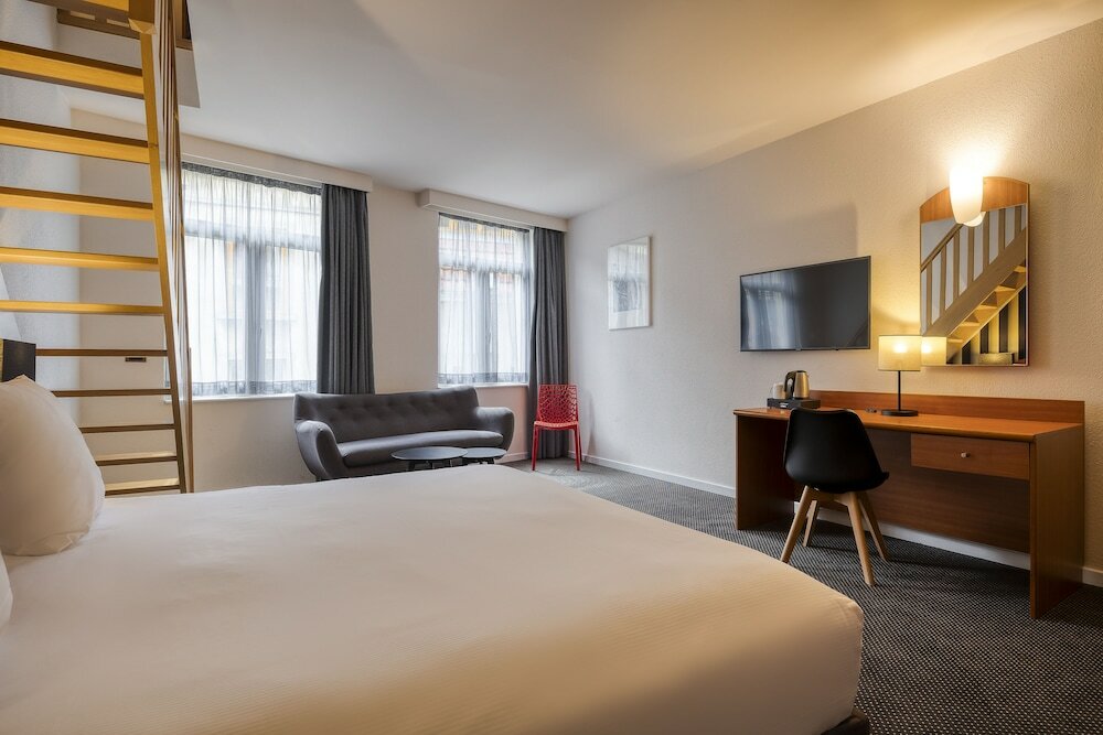 Фото Aris Grand-Place Hotel