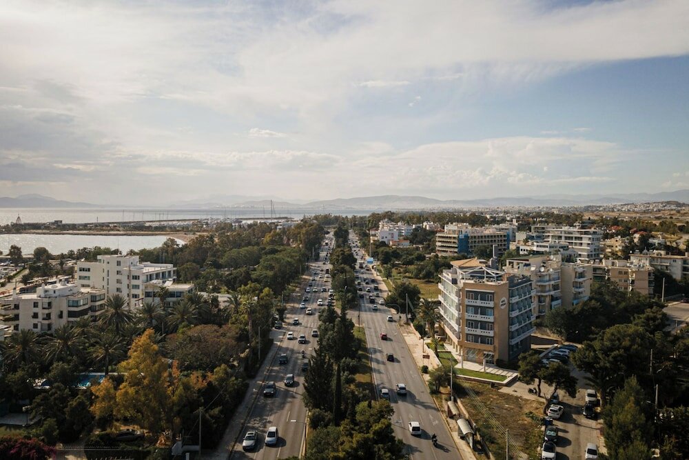 Фото Kreoli Suites Glyfada