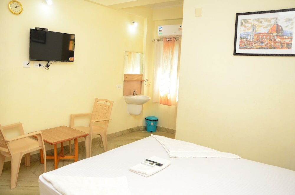 Фото Hotel Amutham Residency