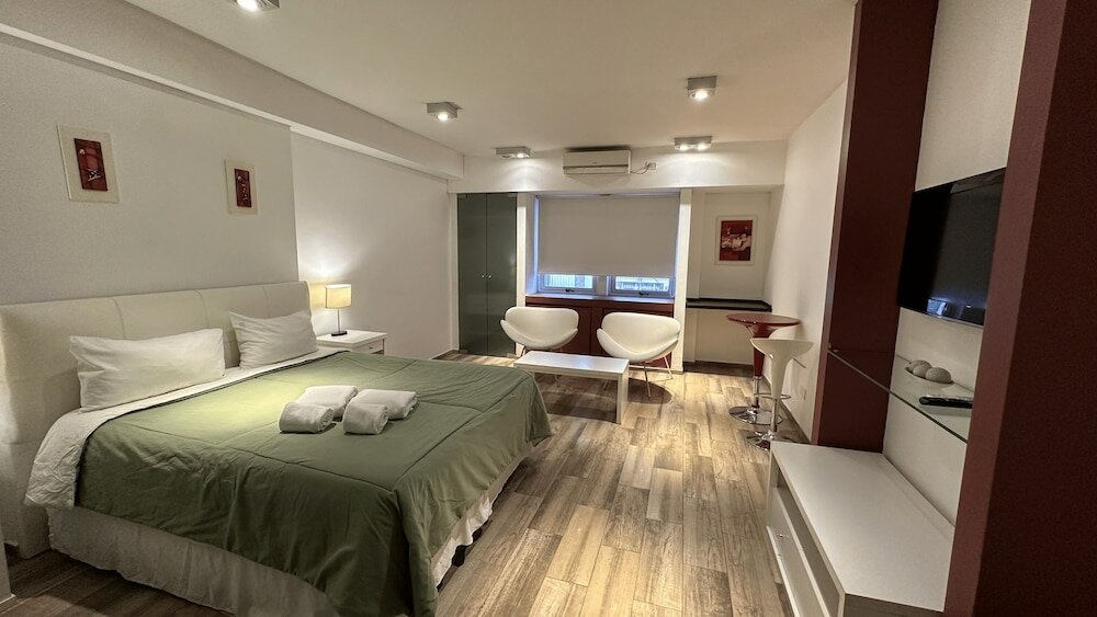 Фото Bens Downtown Apartments