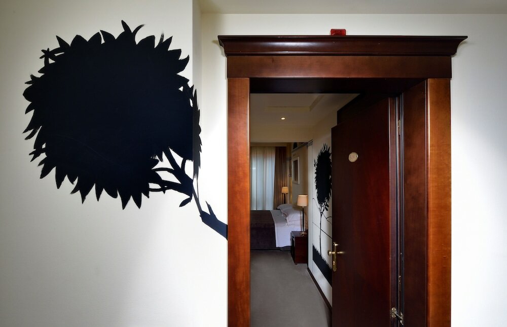 Фото Phi Hotel Bologna