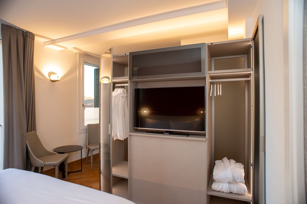 Фото Padova Suites C20