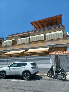 Гостиница Mondo House в Фьюмичино