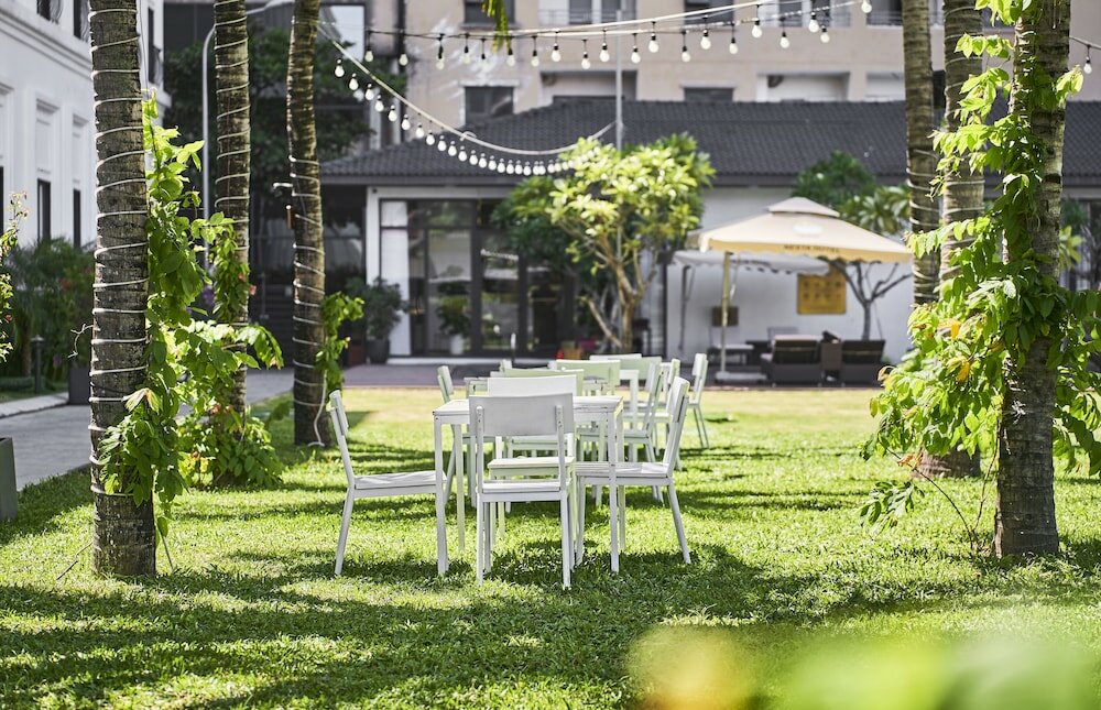 Фото Nesta Hotel Da Nang