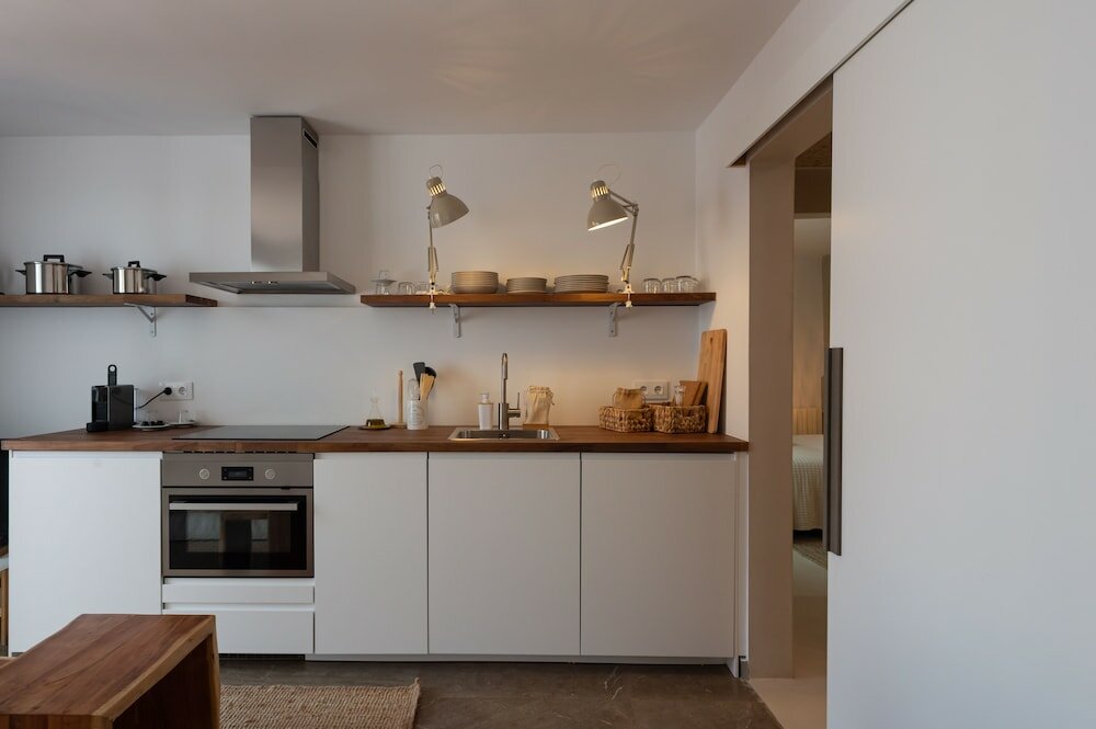 Фото Hostal Es Niu de Tamariu