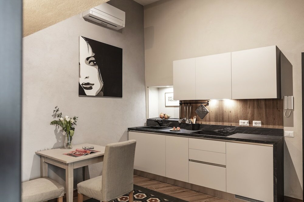 Фото Roommo Apartments