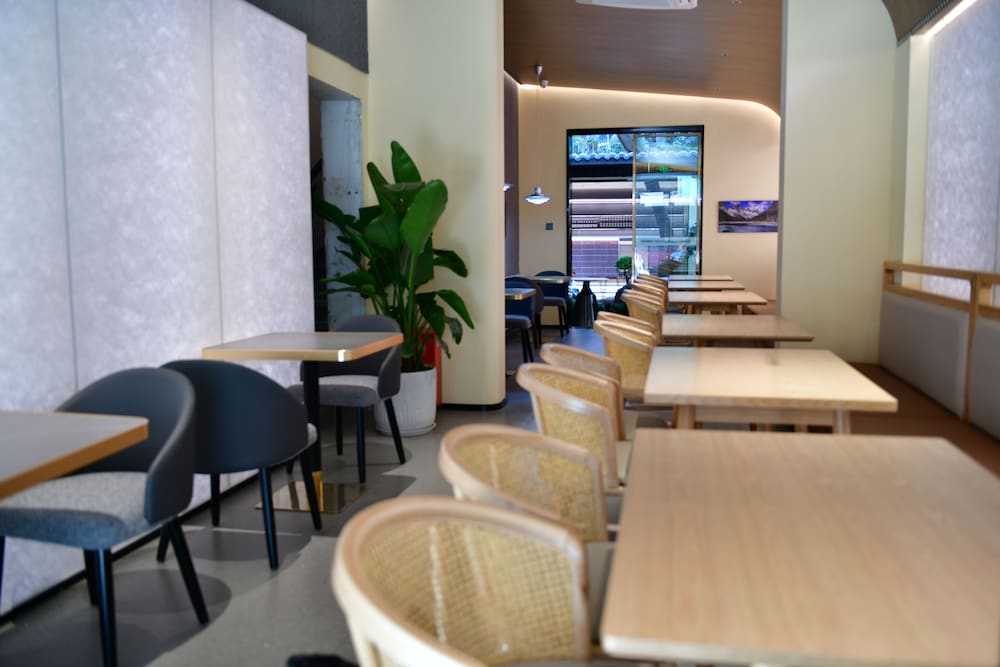 Фото Xishu Garden Inn