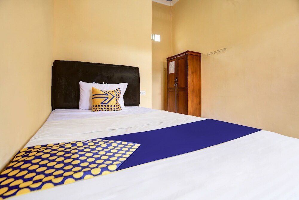 Фото Spot On 90433 Serasi Kost