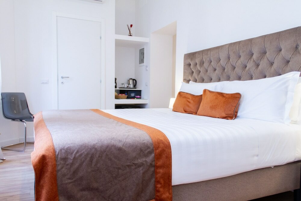 Фото Home at Rome Vatican Suites