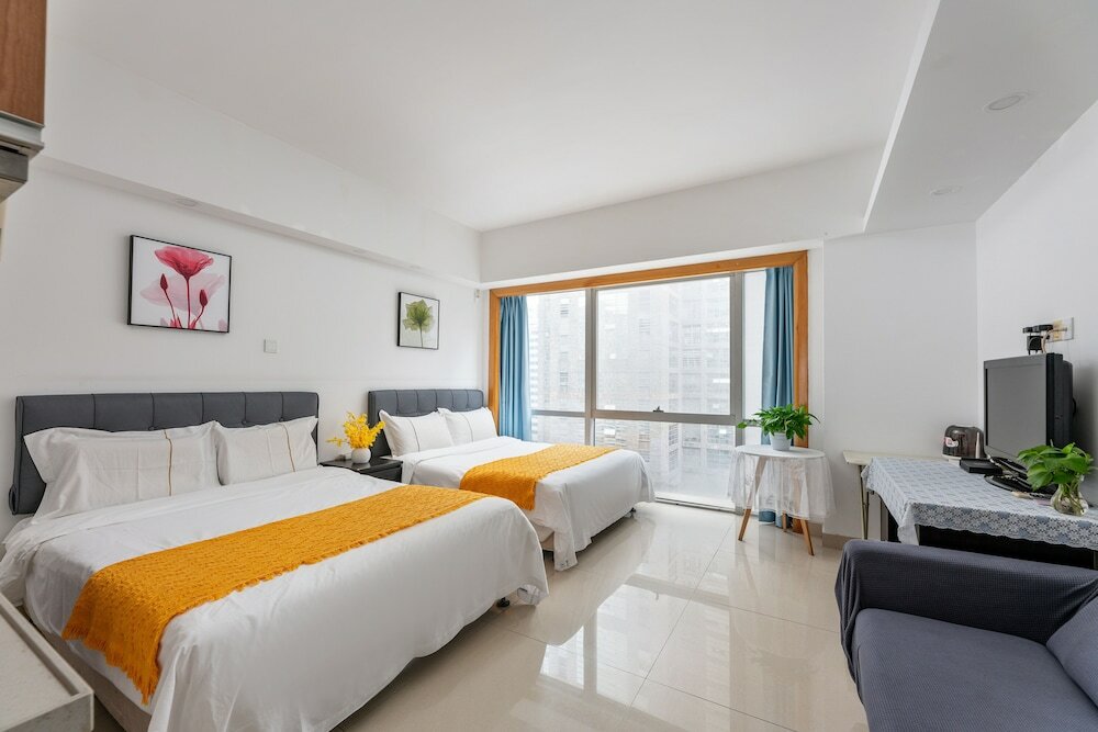 Фото Guangzhou Damei Apartment