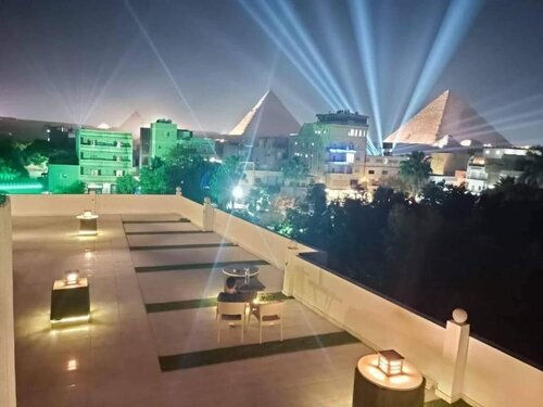 Nefertiti pyramids view -
