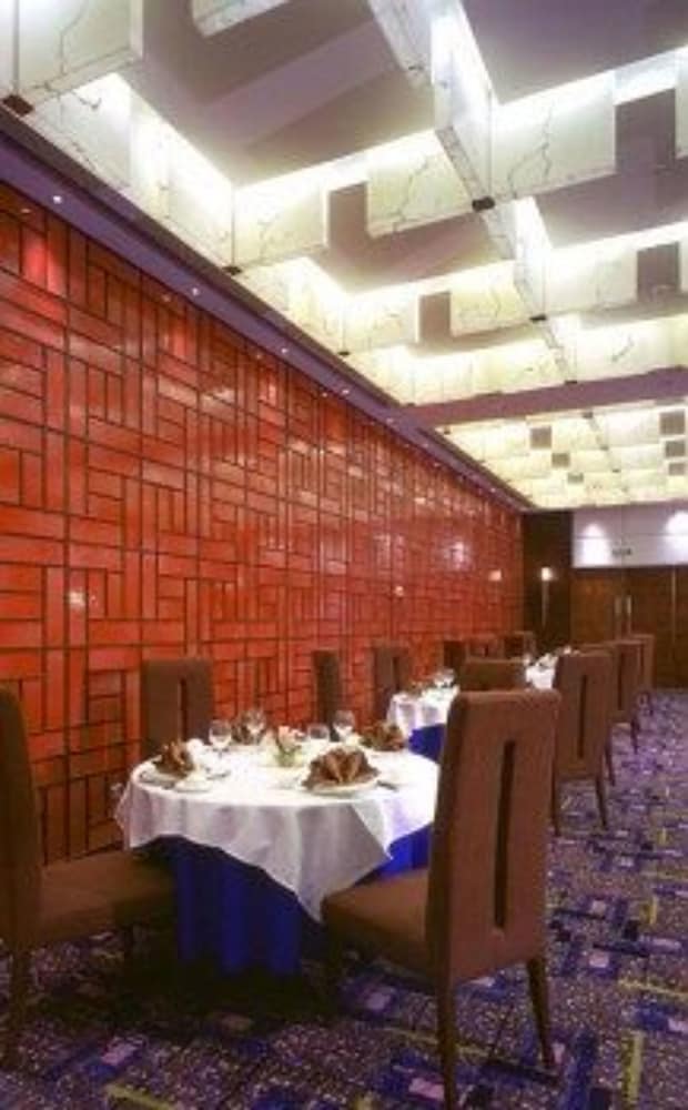 Фото Grand New Century Hotel Binhai Tianjin