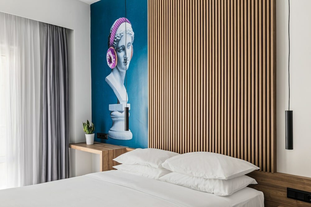 Фото The Q Hotel