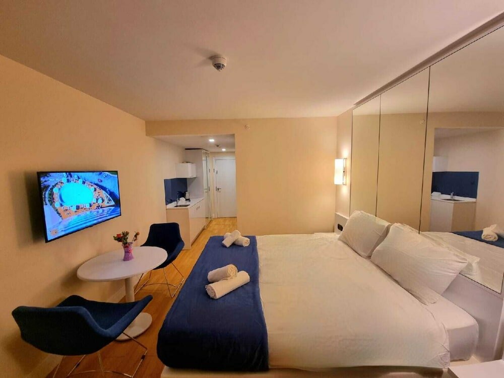 Фото Orbi Hotel Apartments