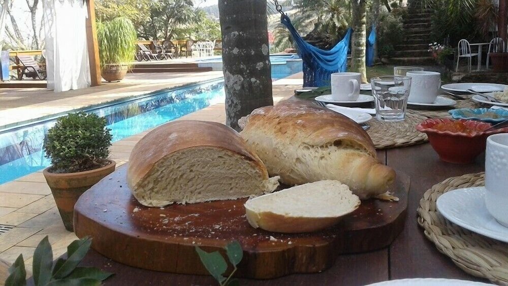 Фото Hospedaria Casa da Pedra