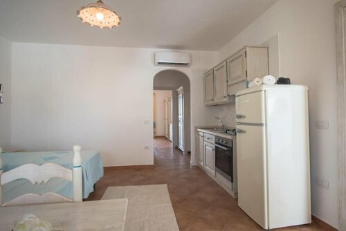 Апартаменты Superb Le Residenze del Golfo di Orosei 1 Bed Room Apartment Sleeps 5 в Орозеи