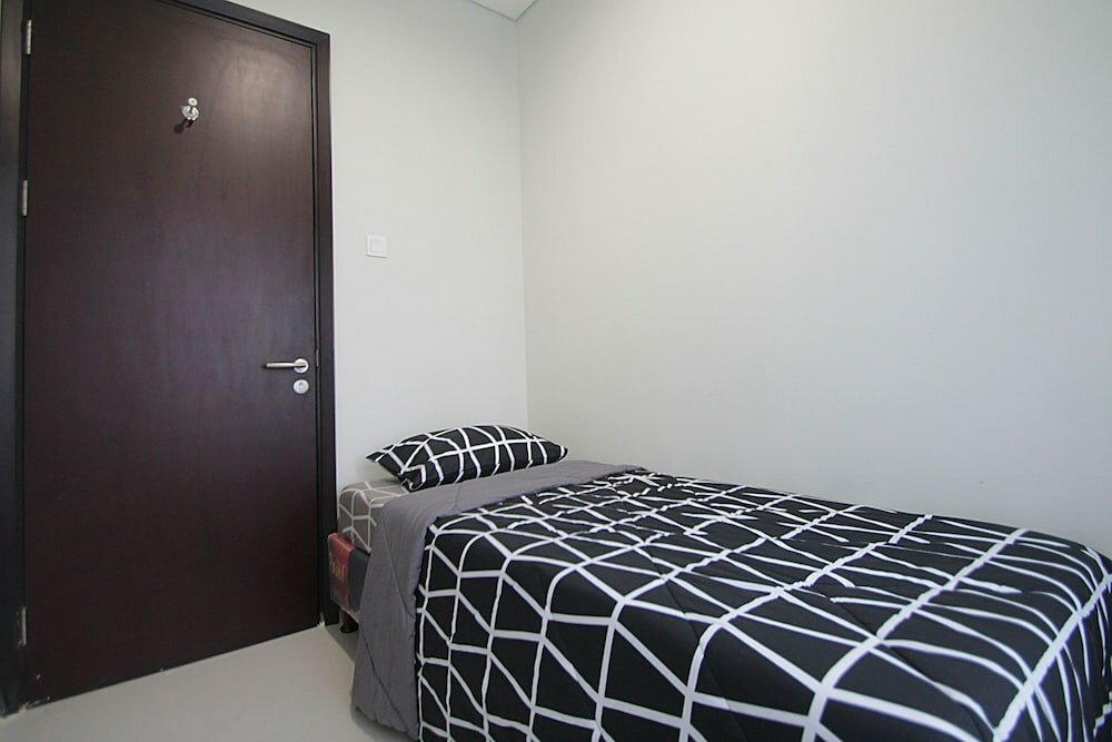 Фото Puri Mansion Apartment