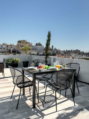 Апартаменты Thisean Modern Suites by Athens Stay в Калифее