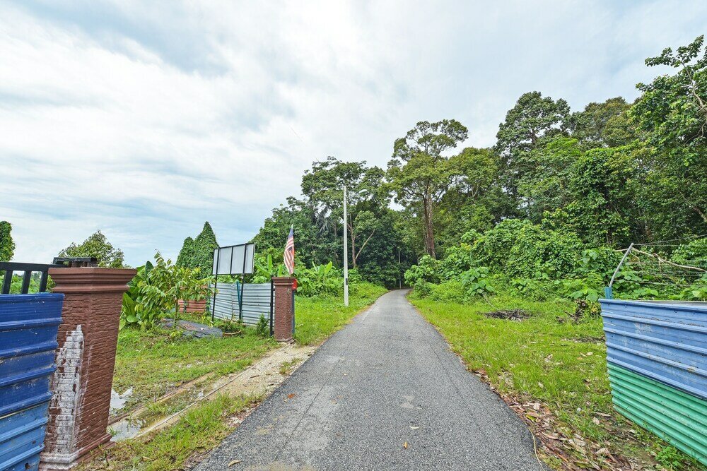 Фото Oyo Home 90682 Liliz Mambang Farmstay