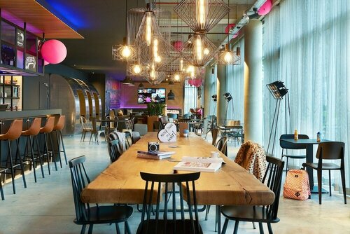 Гостиница Moxy Paris Charles de Gaulle Airport в Руасси-ан-Франс