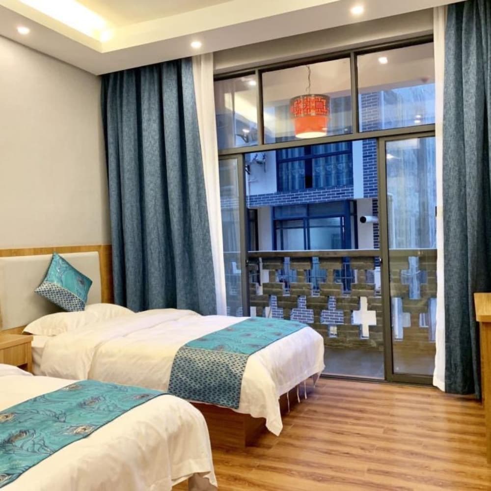 Фото Yangshuo Qingyunge Hotel