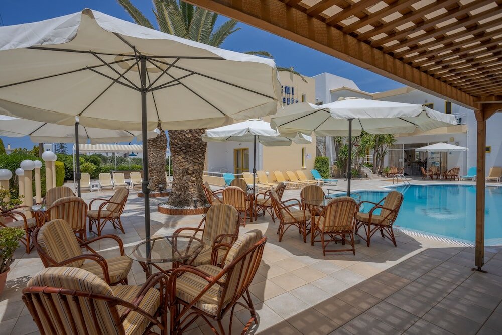 Фото Отель Cosmi Apartments