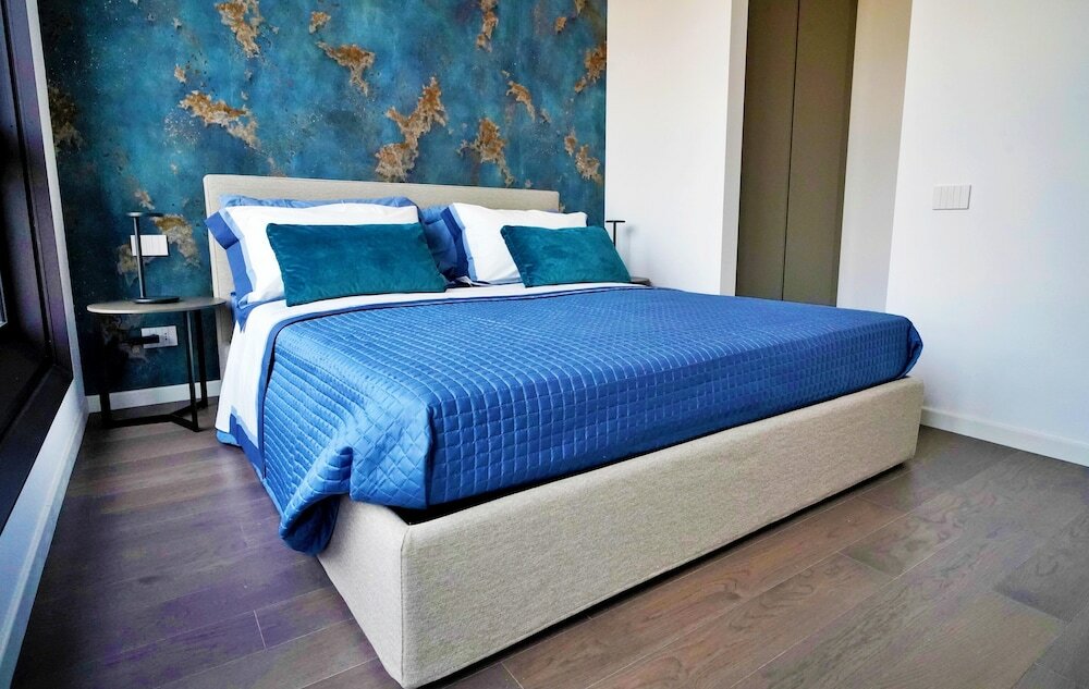 Фото San Babila Modern Apartment