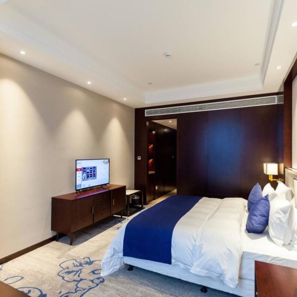 Фото Jinyi Jinglan Hotel