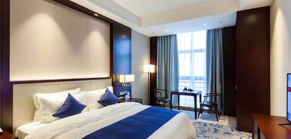 Фото Jinyi Jinglan Hotel